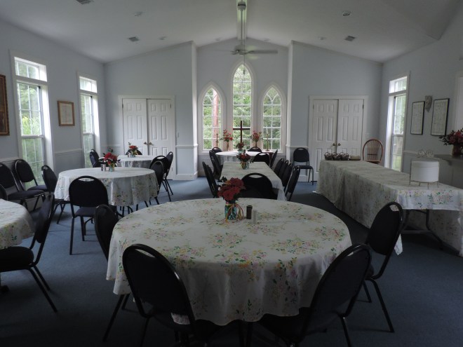 The parish hall decked out in zinnias and loveliness for the party